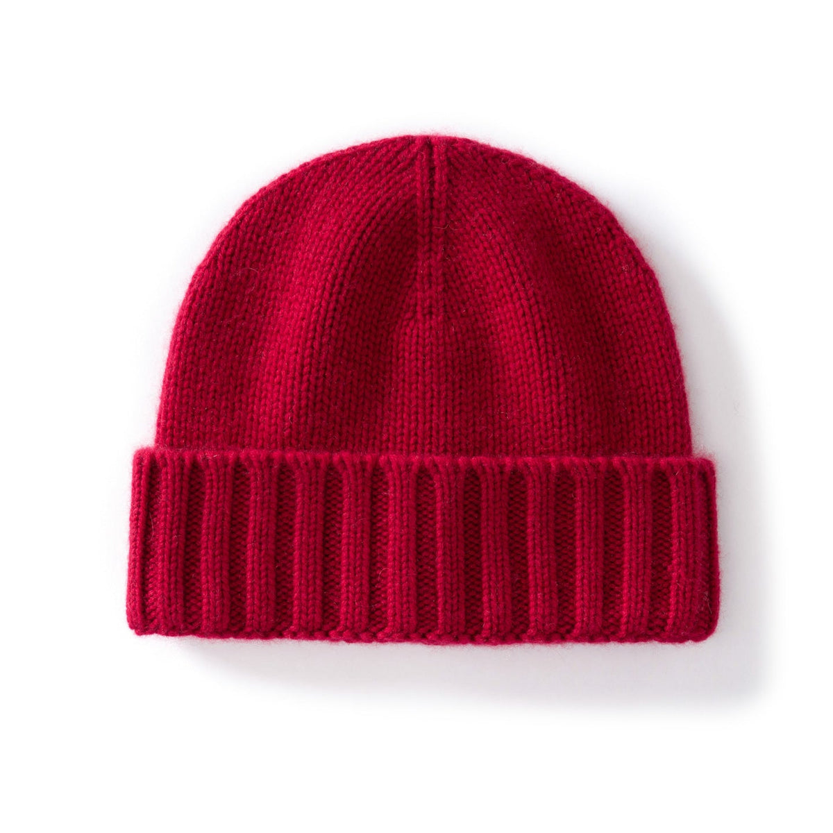 Margo & Main red ribbed cashmere fisherman beanie — angled view of the fold-over cuff and knit crown