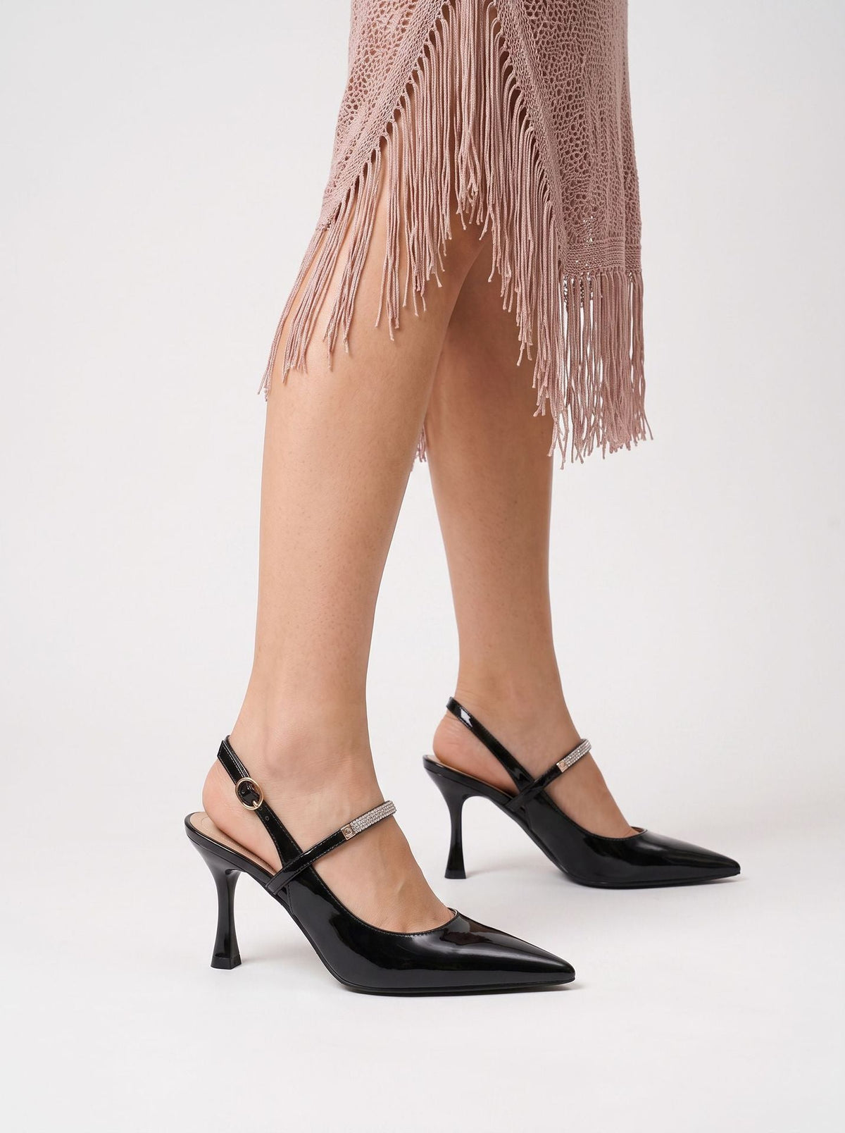 Moncelia black crystal strap slingback pumps, front view on model standing, women's sizes 4.5 to 9.5