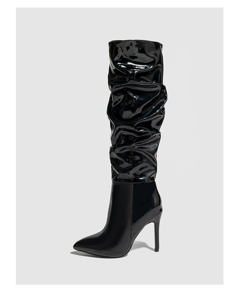 Moncelia black ruched patent knee-high boots, single boot showing pointed toe, women's sizes 5 to 11.5