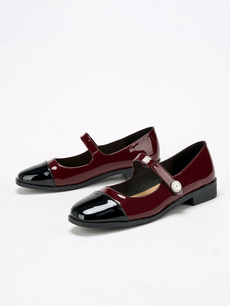 Moncelia burgundy cap toe pearl button Mary Janes, pair shown from the side, women's sizes 5 to 12