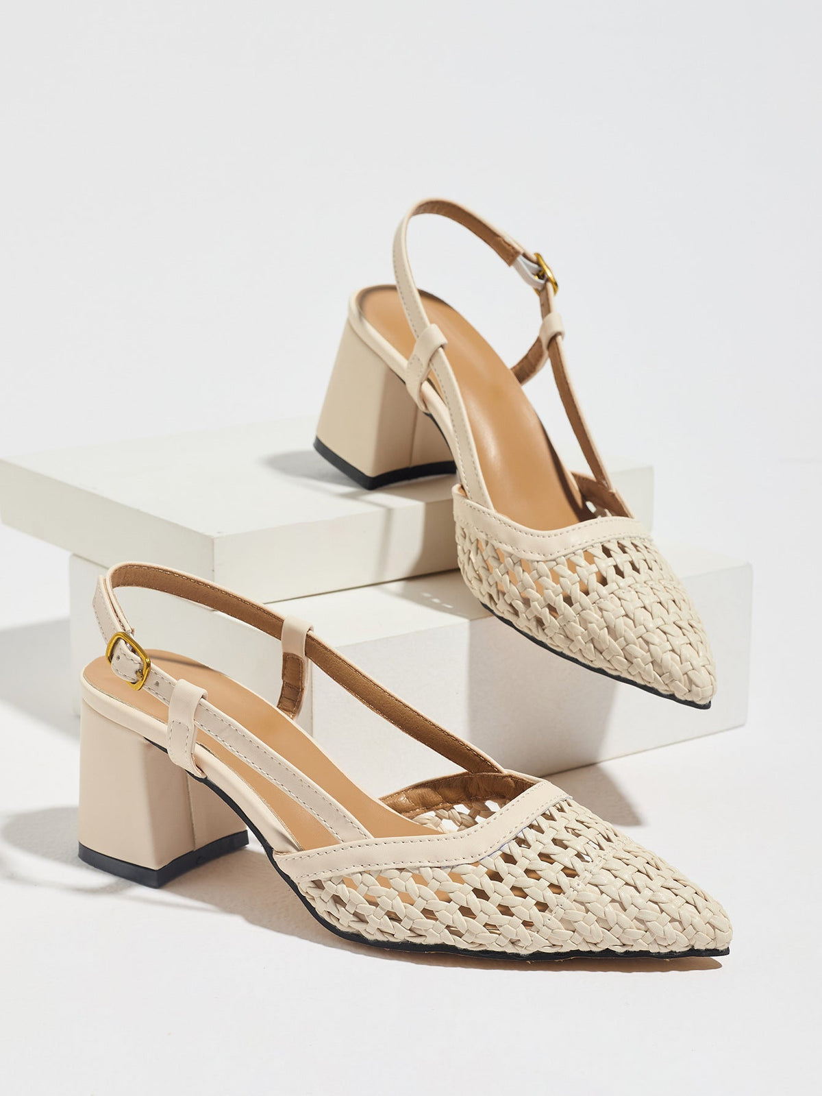 Moncelia cream woven block heel slingbacks, pair shown on a white display block, women's sizes 5 to 12