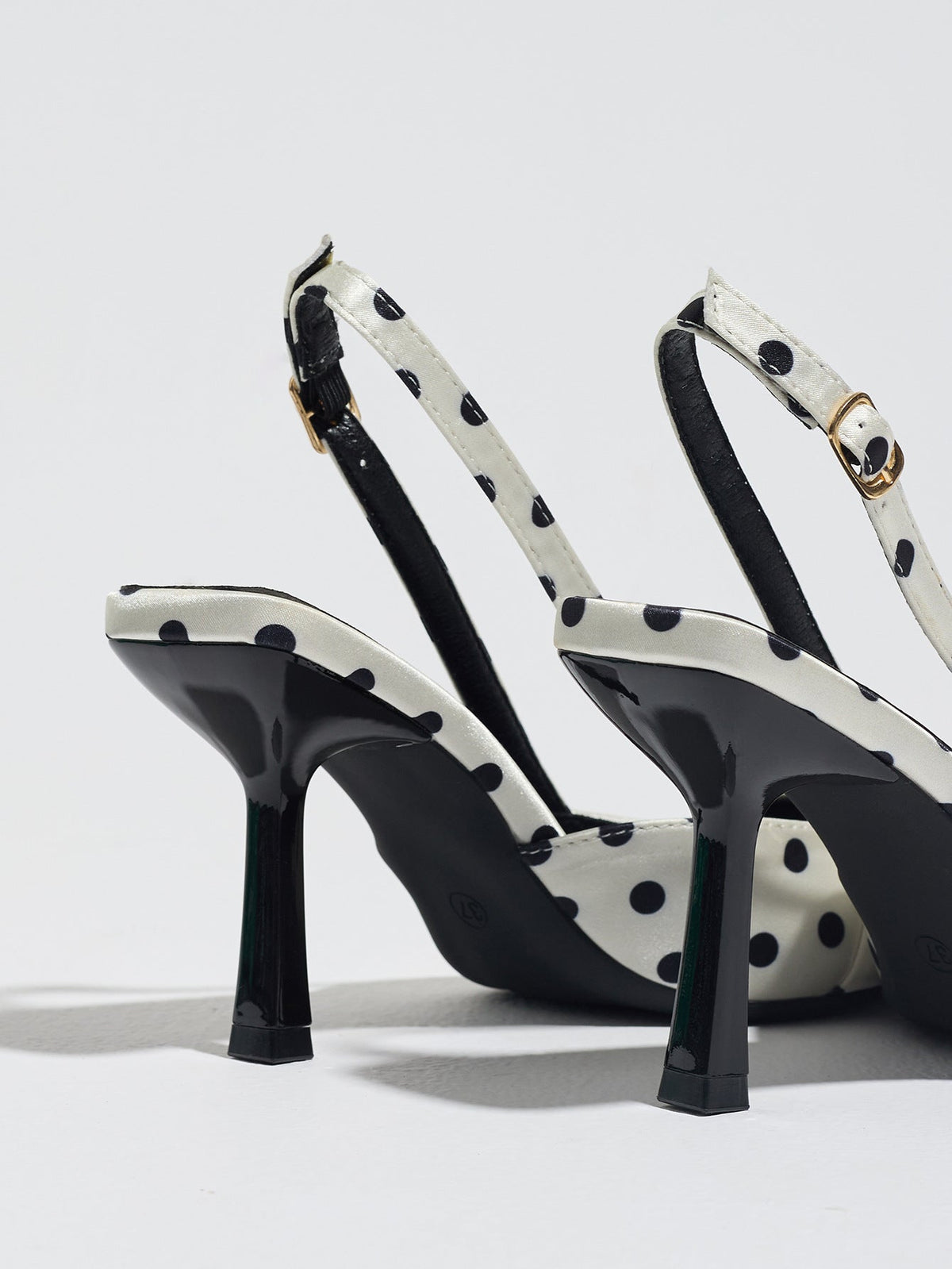 Moncelia ivory polka dot satin slingbacks, back view showing black heels and buckles, women's sizes 5 to 12