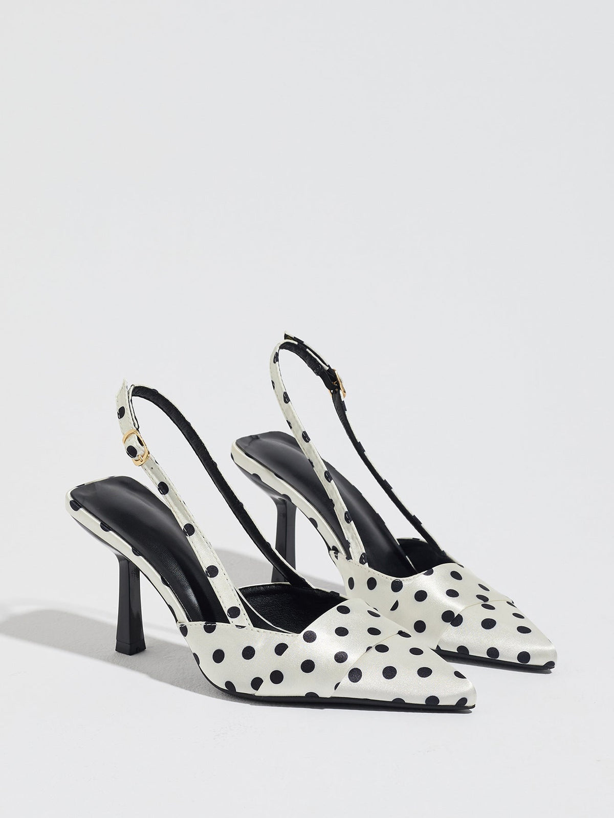 Moncelia ivory polka dot satin slingbacks, pair shown from the side with black dots, women's sizes 5 to 12
