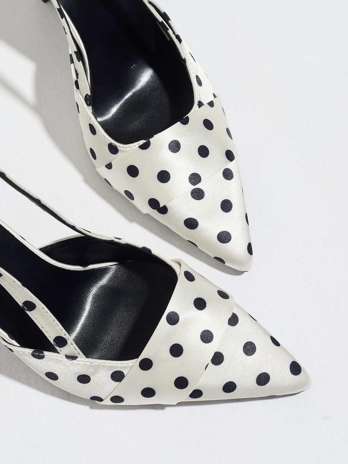 Moncelia ivory polka dot satin slingbacks, close-up of pointed toe with black dots, women's sizes 5 to 12
