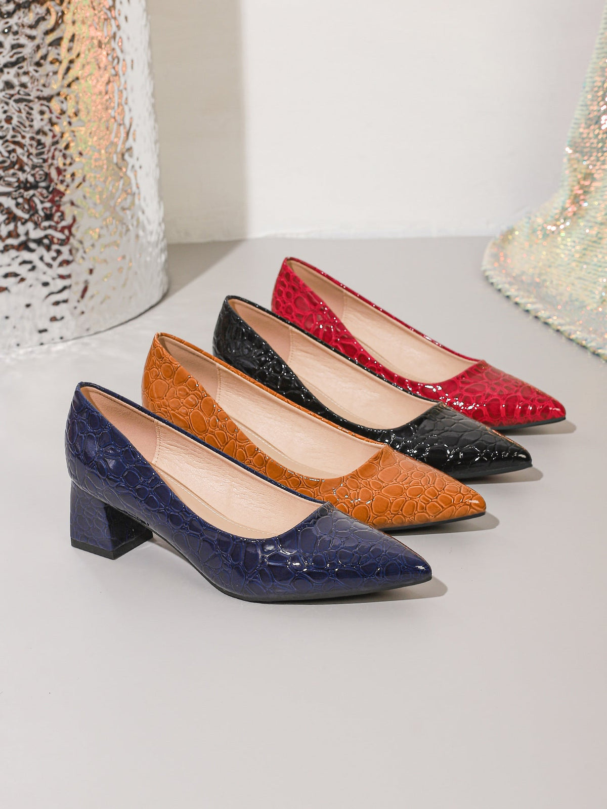 Moncelia navy and black croc-embossed block heel pumps, all colours side by side, women's sizes 5.5 to 12