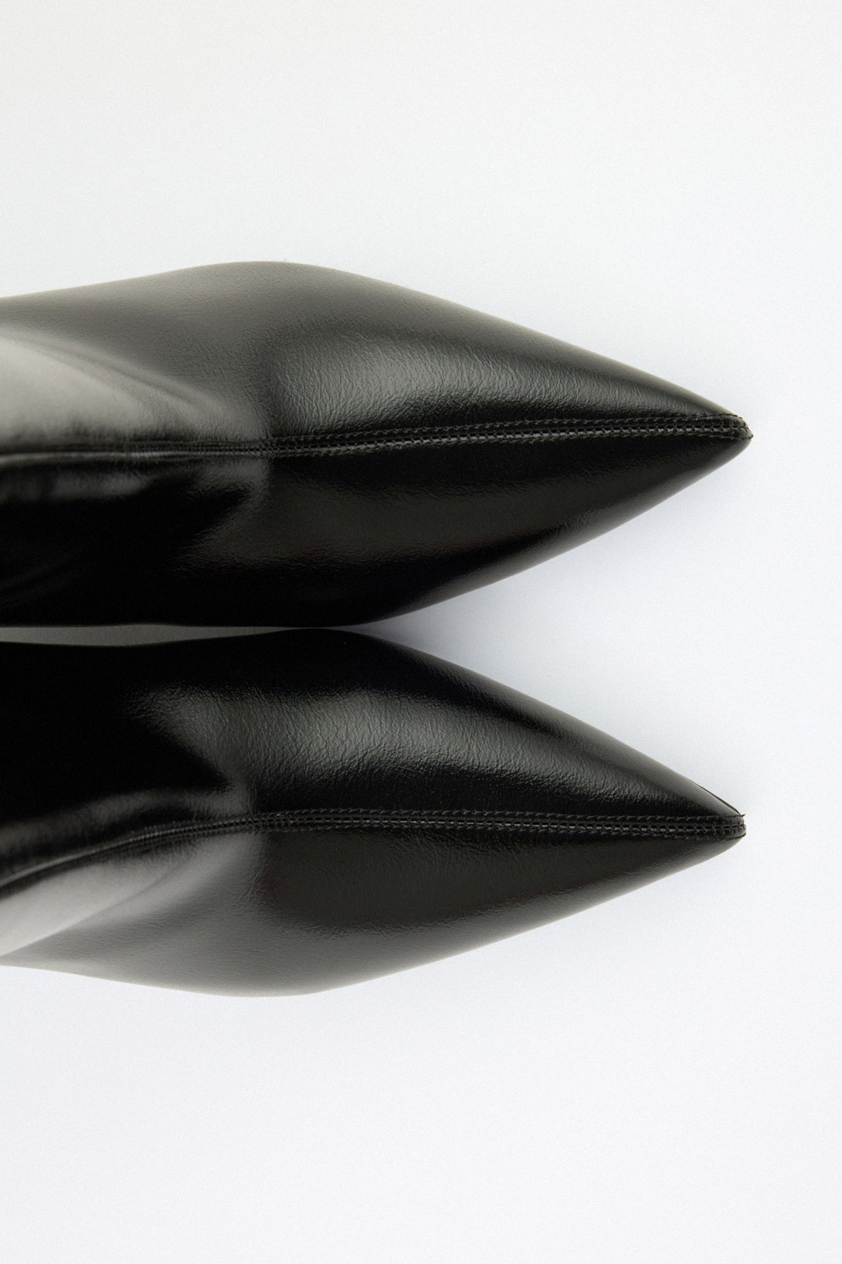 Moncelia black pointed toe kitten heel booties, close-up of pointed toe, women's sizes 5 to 12