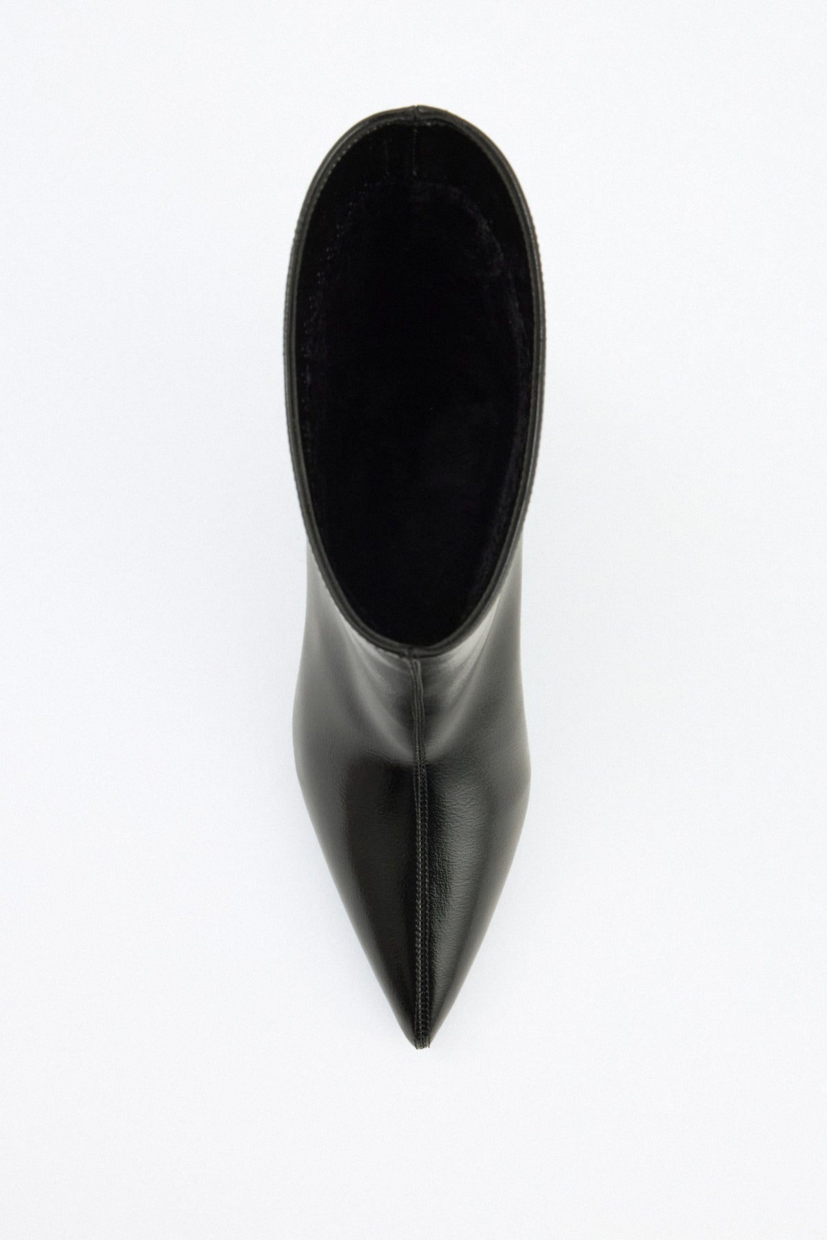 Moncelia black pointed toe kitten heel booties, single bootie seen from above, women's sizes 5 to 12