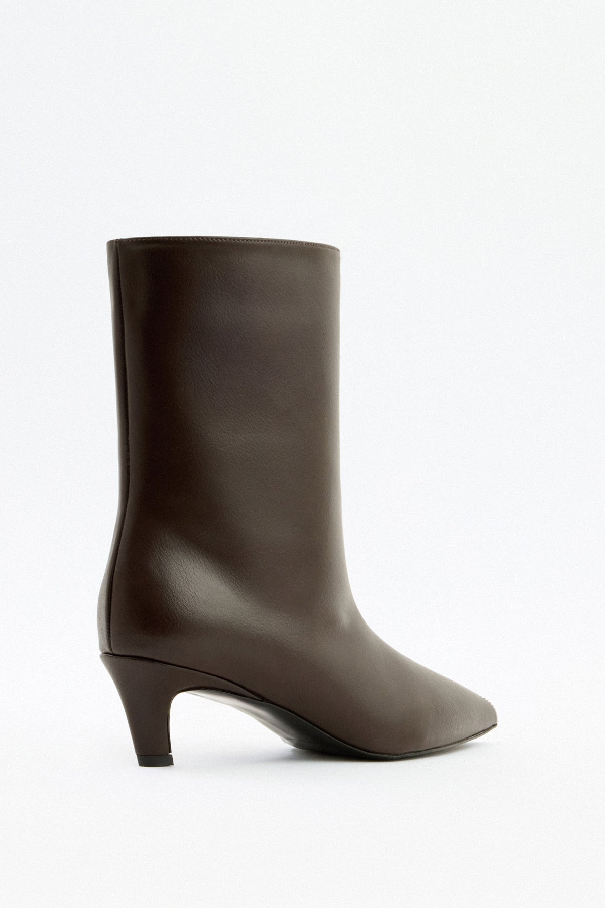 Moncelia brown pointed toe kitten heel booties, back view showing curved kitten heel, women's sizes 5 to 12