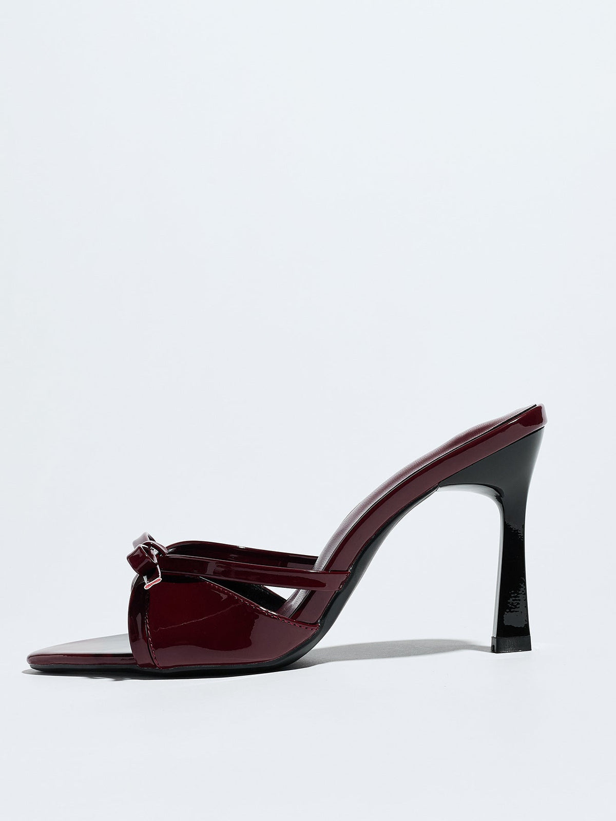 Moncelia burgundy bow pointed toe heeled mules, single mule in profile showing heel, women's sizes 5 to 12