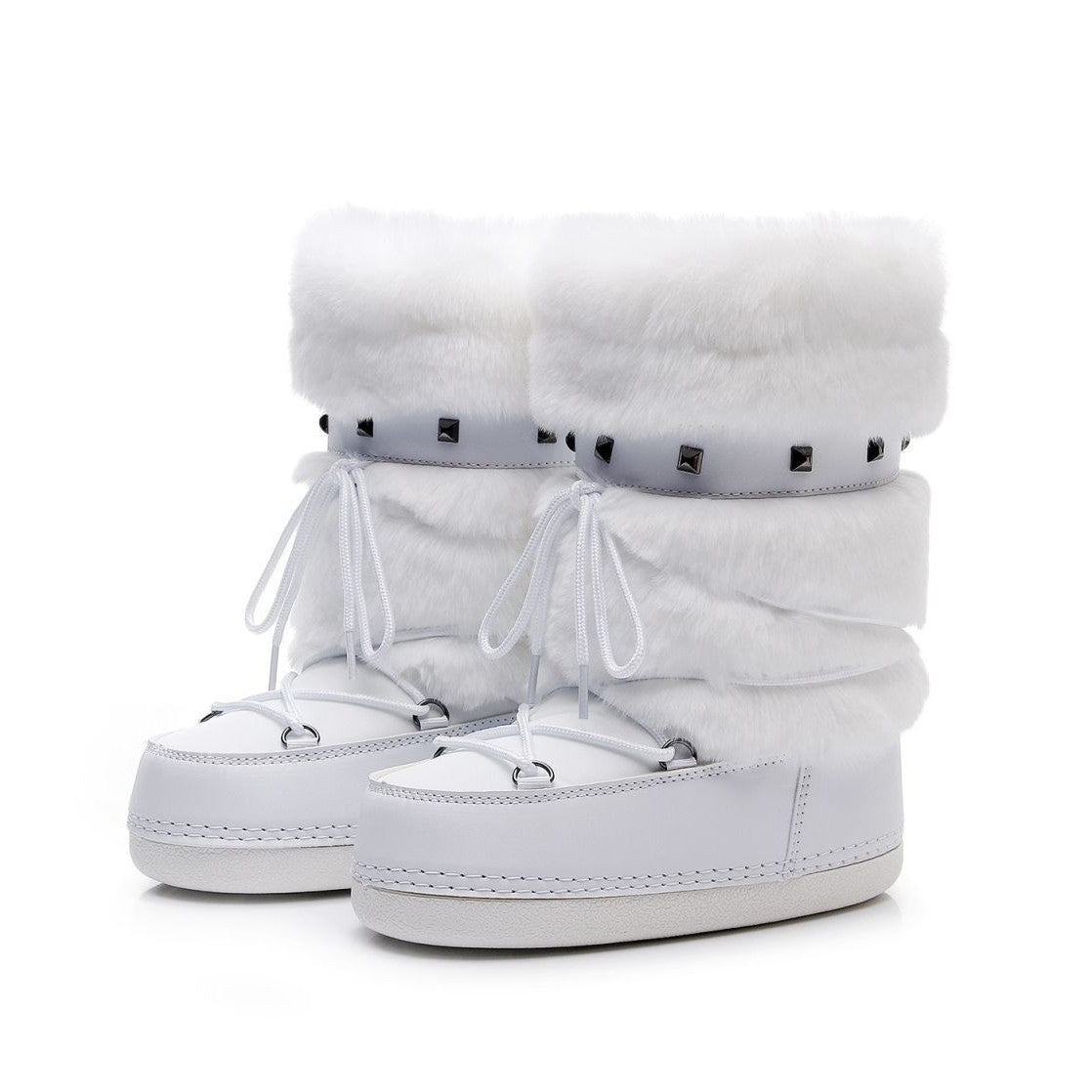 Moncelia white faux fur studded platform snow boots, pair shown at an angle with laces, women's sizes 5.5 to 9
