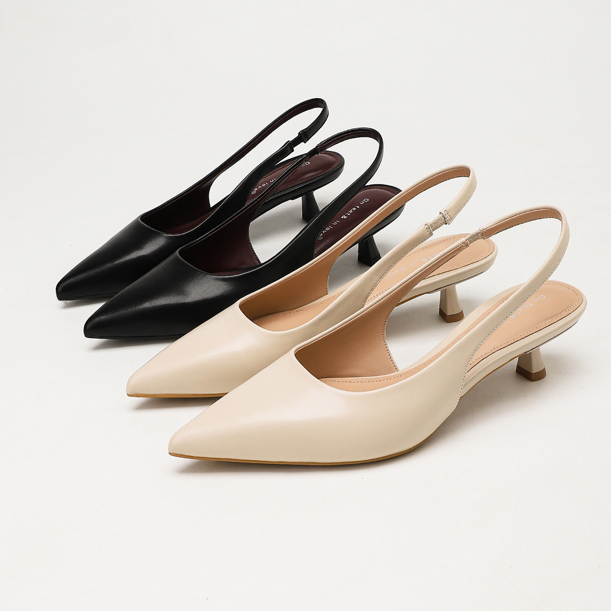Moncelia black and apricot pointed toe slingback spool heels, shown side by side, women's sizes 5 to 11.5