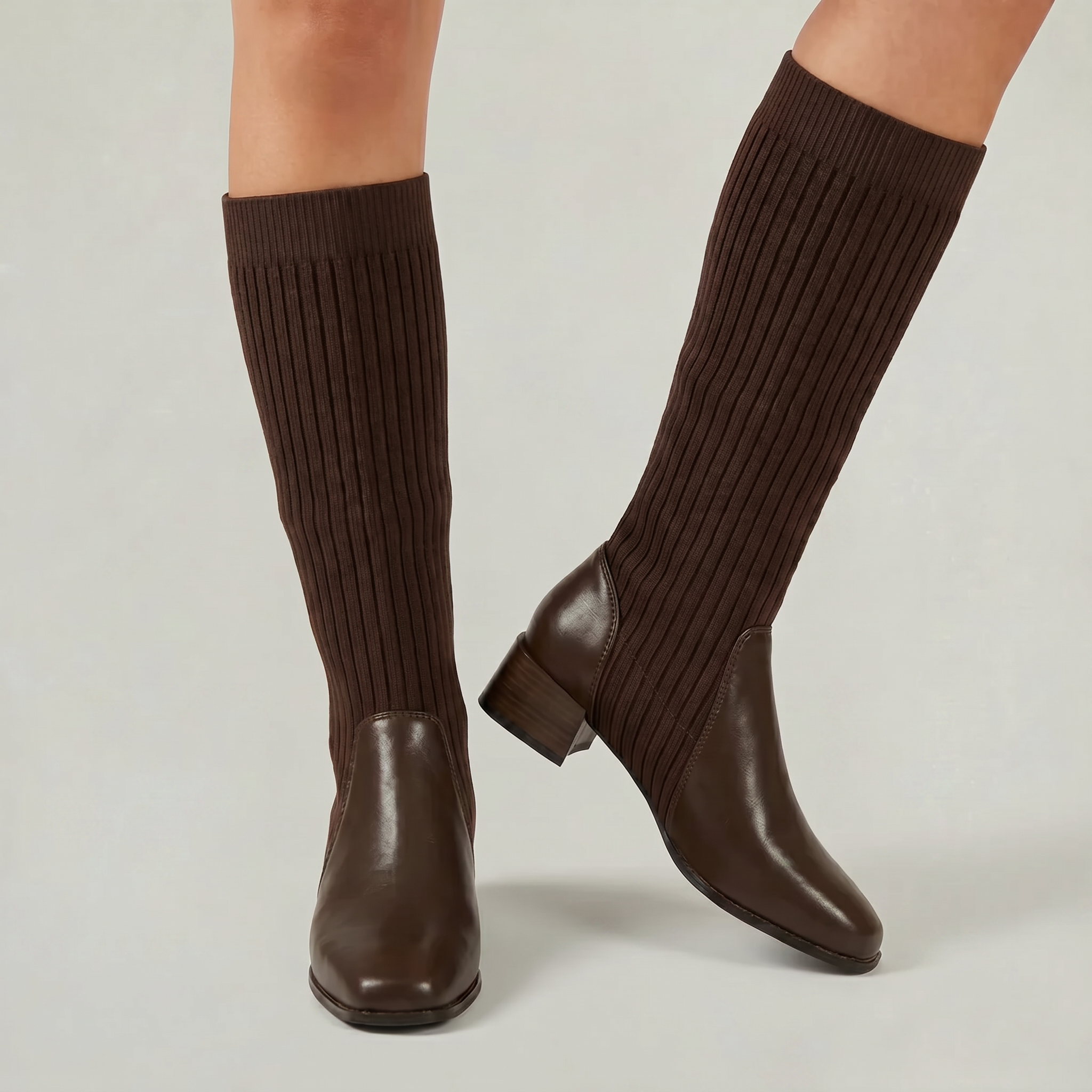 Ribbed knit block heel knee-high boots styled for fall