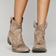 Moncelia Nieves Distressed Faux Suede Western Ankle Booties