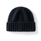 Margo & Main black ribbed cashmere fisherman beanie — angled view of the wide fold-over ribbed cuff