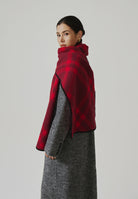 Margo & Main red check scarf — angled view of the long scarf draped down the front