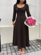 Margo & Main chocolate textured knit maxi dress — long sleeves and A-line skirt with bouquet