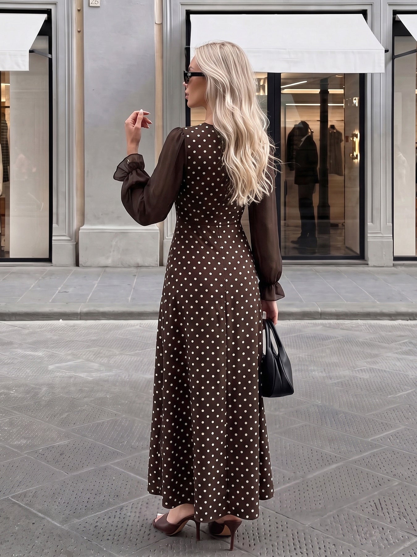 Margo & Main brown polka dot maxi dress — back view of the long sleeves and A-line skirt, US women's sizes