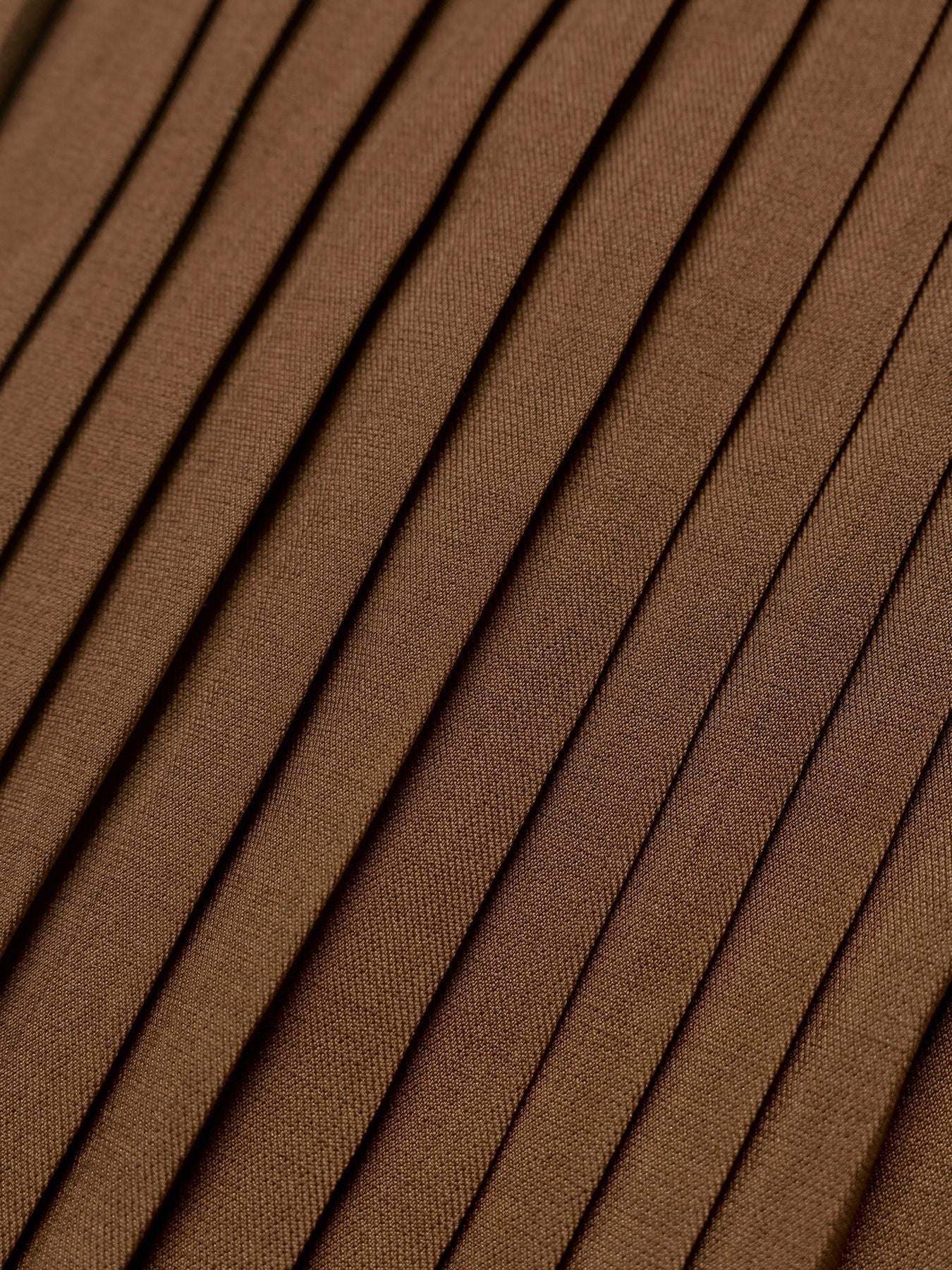 Margo & Main chocolate velvet midi dress — close-up of the knife pleats on the midi skirt