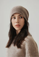 Margo & Main tan wool beanie — front view with the knitted brim folded neatly above the brow