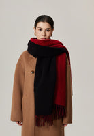 Margo & Main red lamb wool blanket scarf — front view with the fringed hem below the waist