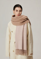 Margo & Main tan lamb wool blanket scarf — angled view of the wrap and its fringed hem