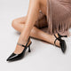 Moncelia black crystal strap slingback pumps, close-up of crystal strap on the foot, women's sizes 4.5 to 9.5