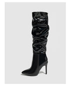 Moncelia black ruched patent knee-high boots, single boot showing pointed toe, women's sizes 5 to 11.5