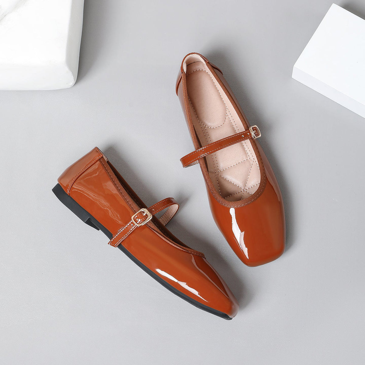 Moncelia brown patent square toe Mary Jane flats, pair shown from above, women's sizes 5 to 12