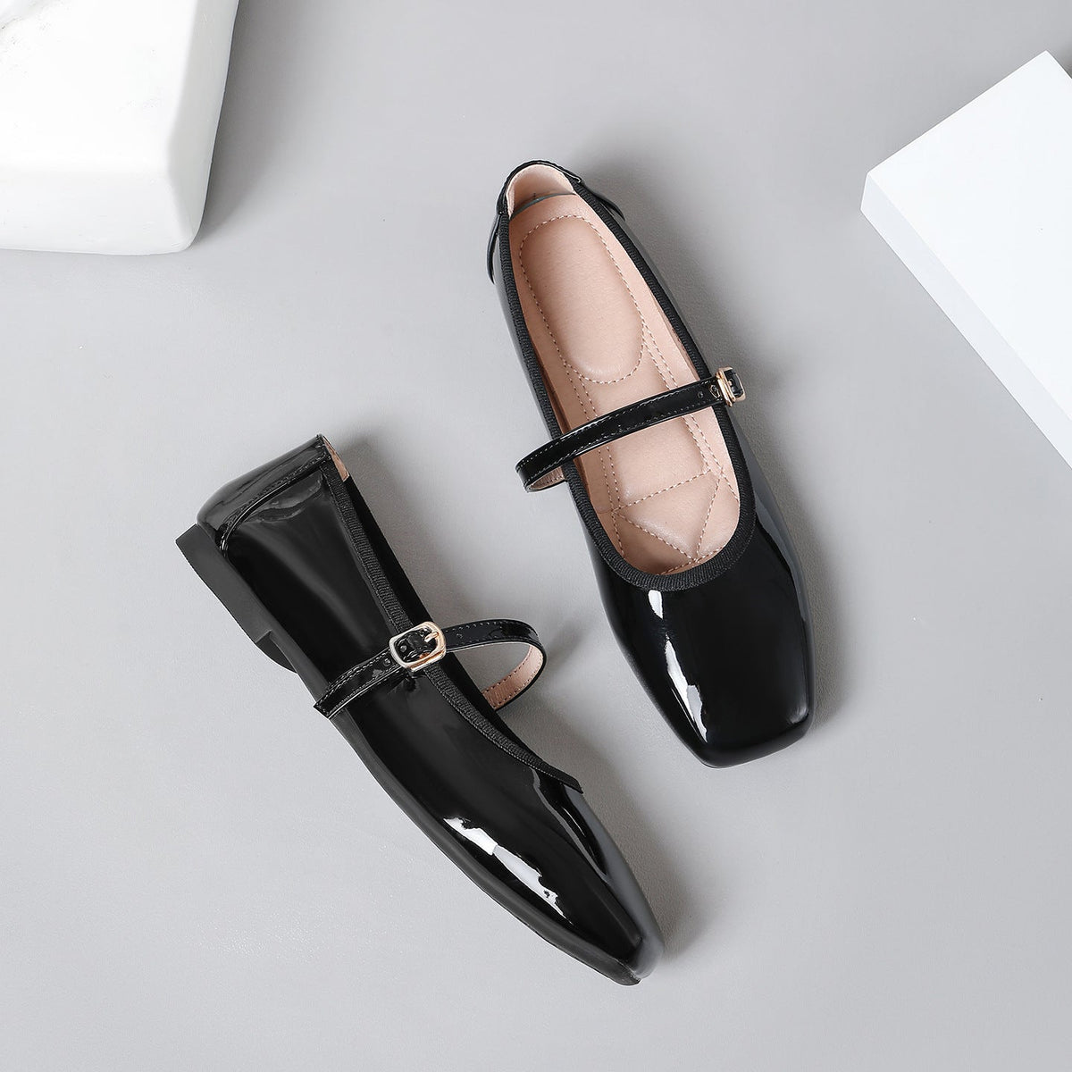Moncelia black patent square toe Mary Jane flats, pair shown from above, women's sizes 5 to 12