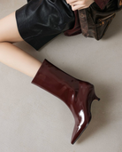 Moncelia burgundy kitten heel ankle boots, side view showing pointed toe, women's sizes 5 to 11.5