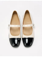 Moncelia ivory cap toe pearl button Mary Janes, pair shown from above, women's sizes 5 to 12