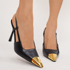 Moncelia black gold cap toe slingbacks, front view on model showing gold cap toe, women's sizes 5 to 11.5