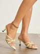 Moncelia apricot bow mesh pointed toe heeled mules, worn on model with a spool heel, women's sizes 5 to 12