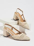 Moncelia cream woven block heel slingbacks, pair shown on a white display block, women's sizes 5 to 12