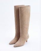 Moncelia beige pointed toe slim heel knee-high boots, pair shown from the front, women's sizes 5 to 12