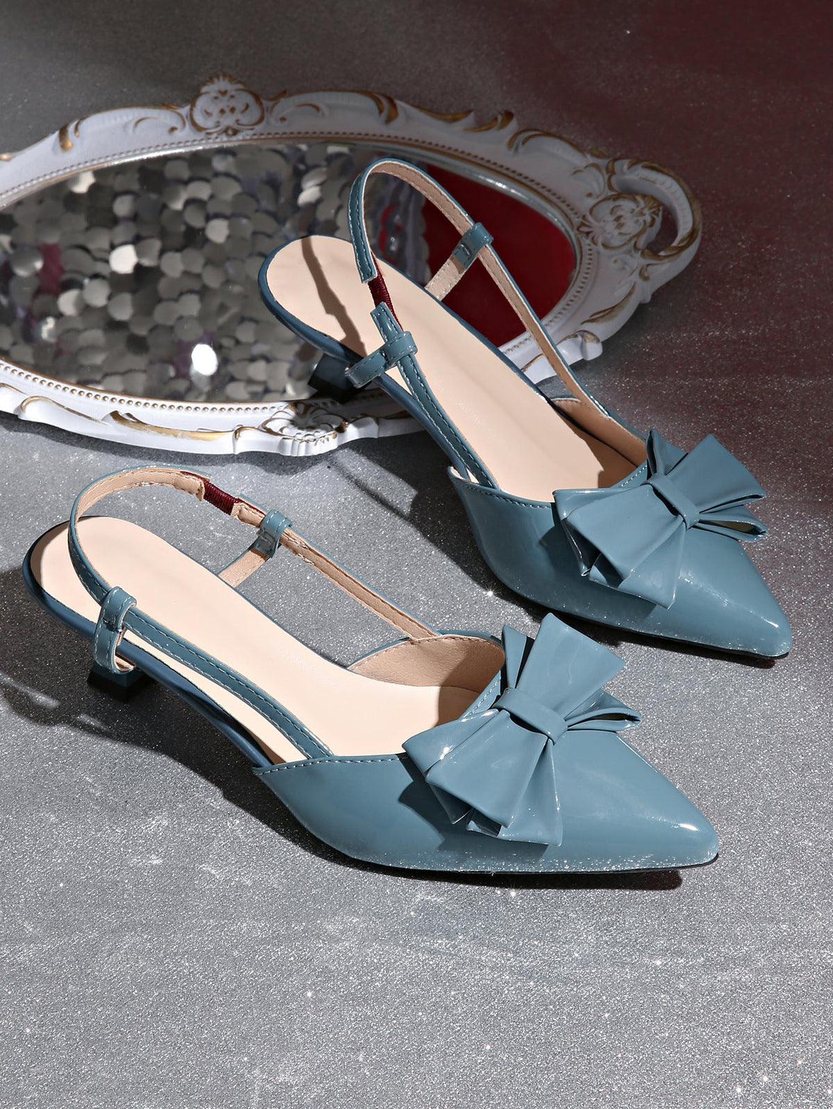 Moncelia blue bow slingback kitten heels, pair shown from the side showing bow, women's sizes 5 to 11.5