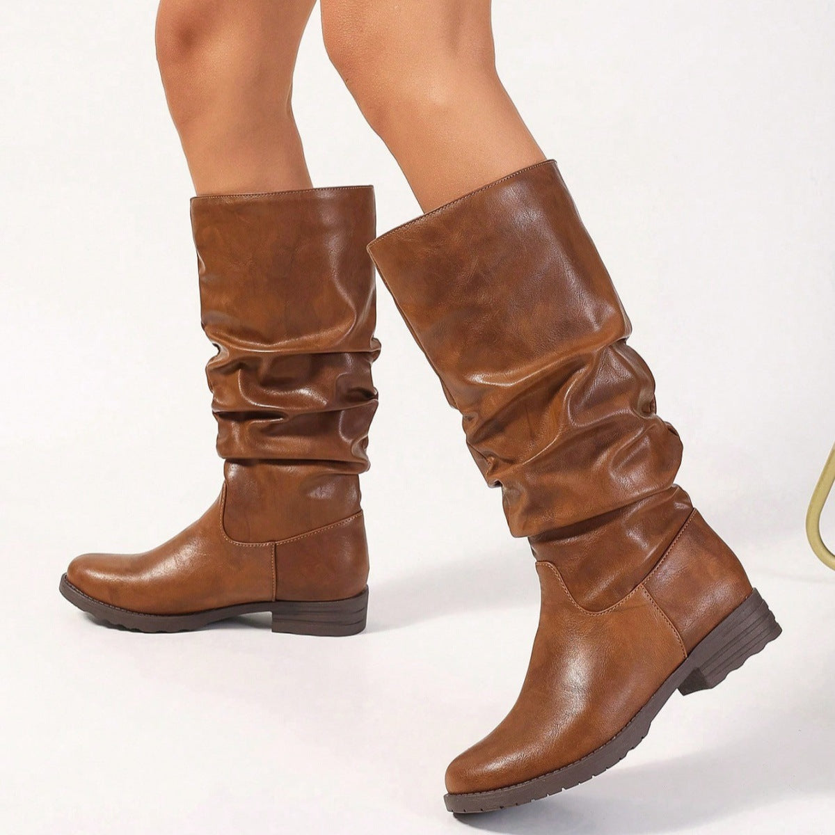 Moncelia camel slouchy pull-on mid-calf boots, side view on model with block heel, women's sizes 5.5 to 11.5