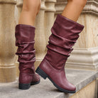 Moncelia burgundy slouchy pull-on mid-calf boots, back view on model showing heel, women's sizes 5.5 to 11.5