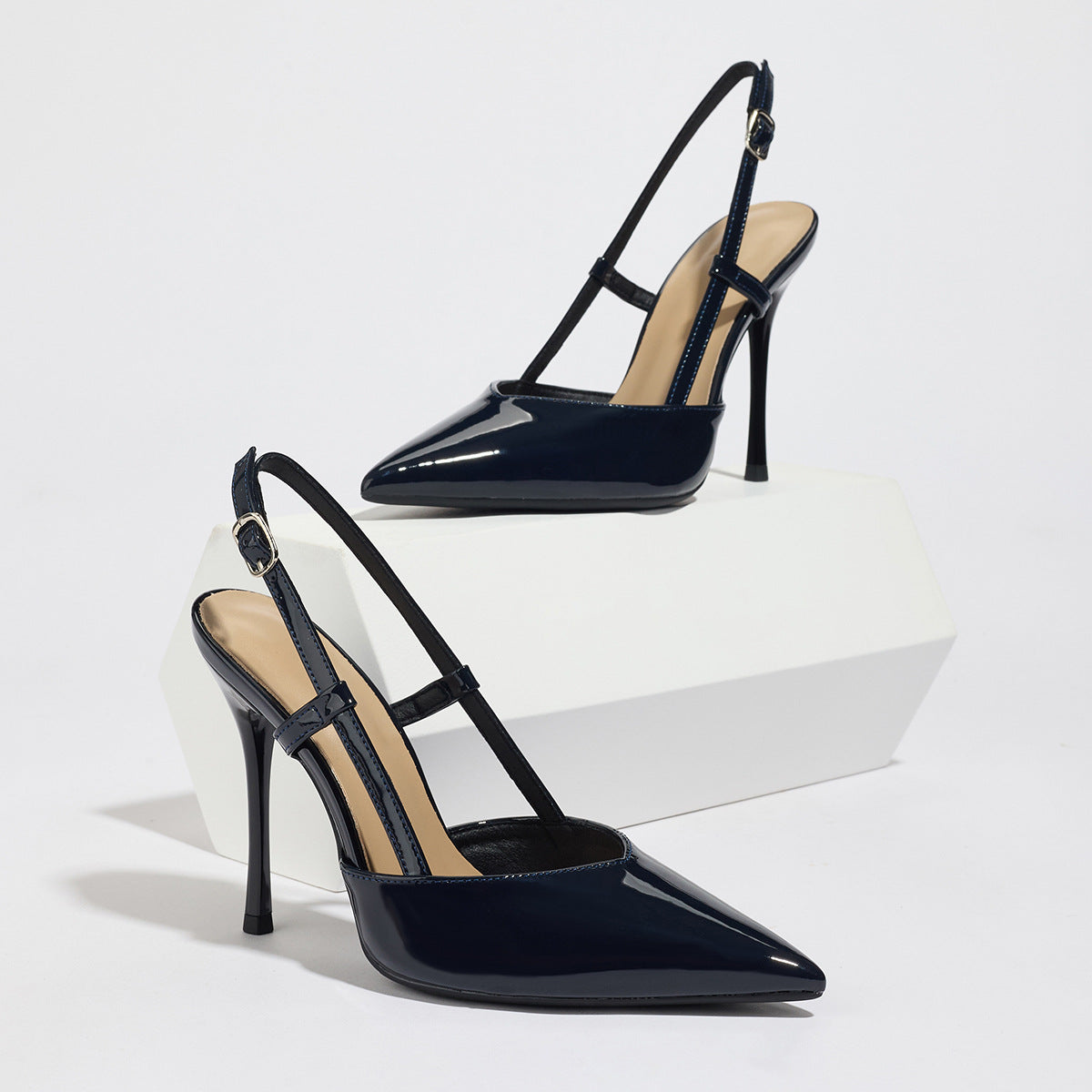 Moncelia black metallic pointed slingback heels, pair shown from the side, women's sizes 5.5 to 11.5