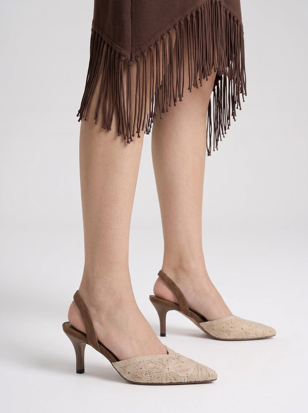 Moncelia brown crochet pointed slingback heels, front view with a fringe skirt, women's sizes 5 to 10.5