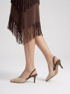 Moncelia brown crochet pointed slingback heels, side view on model walking, women's sizes 5 to 10.5