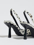 Moncelia ivory polka dot satin slingbacks, back view showing black heels and buckles, women's sizes 5 to 12