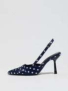 Moncelia navy polka dot satin slingbacks, single shoe in profile showing flared heel, women's sizes 5 to 12