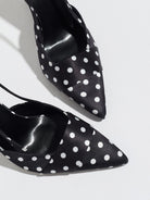 Moncelia black polka dot satin slingbacks, close-up of pointed toe and white dots, women's sizes 5 to 12