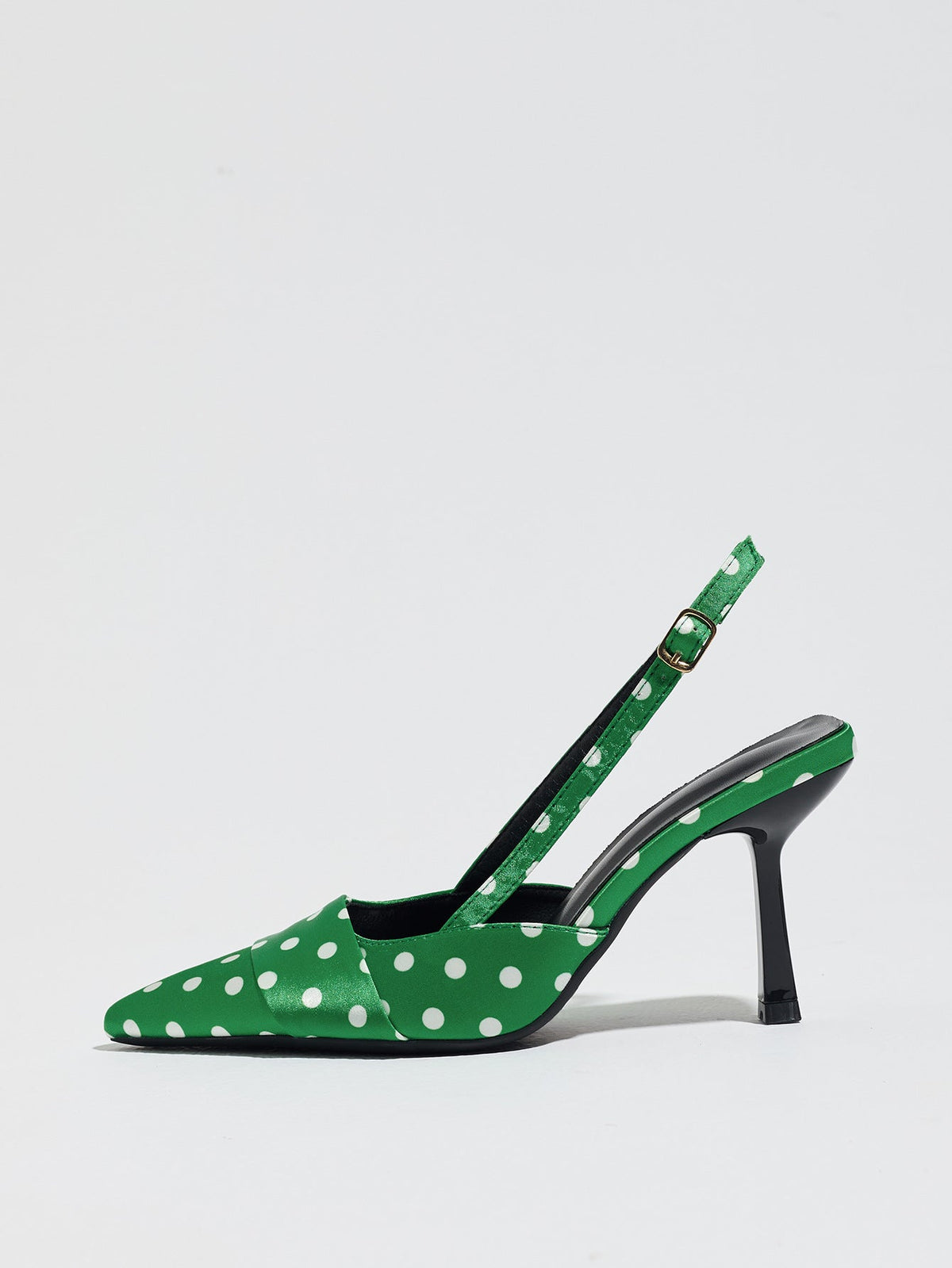 Moncelia green polka dot satin slingbacks, single shoe in profile showing flared heel, women's sizes 5 to 12