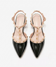 Moncelia black studded T-strap flats, pair shown from above with gold studs, women's sizes 5 to 10.5