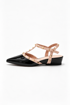 Moncelia black studded T-strap flats, single shoe showing buckled ankle strap, women's sizes 5 to 10.5