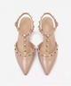 Moncelia beige studded T-strap flats, pair shown from above with gold studs, women's sizes 5 to 10.5