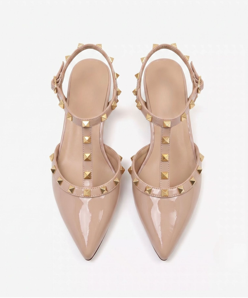 Moncelia beige studded T-strap flats, pair shown from above with gold studs, women's sizes 5 to 10.5