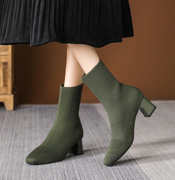Moncelia green knit sock ankle boots, side view on model showing block heel, women's sizes 5.5 to 12